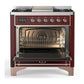 Ilve UM36FQNR3BUPLP Ilve Um36Fqnr3Buplp Majestic Iii 36 Inch Dual Fuel Range With 6 Black Brass Burners And Griddle, Dual Function Burner Up To 25,000 Btu (Solid Door, Burgundy, Copper, Liquid Propane)