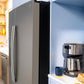 Ge Appliances GSS28NMYES Ge® 27.9 Cu. Ft. Side-By-Side Refrigerator With Extra Tall Dispenser And In-Door Icemaker