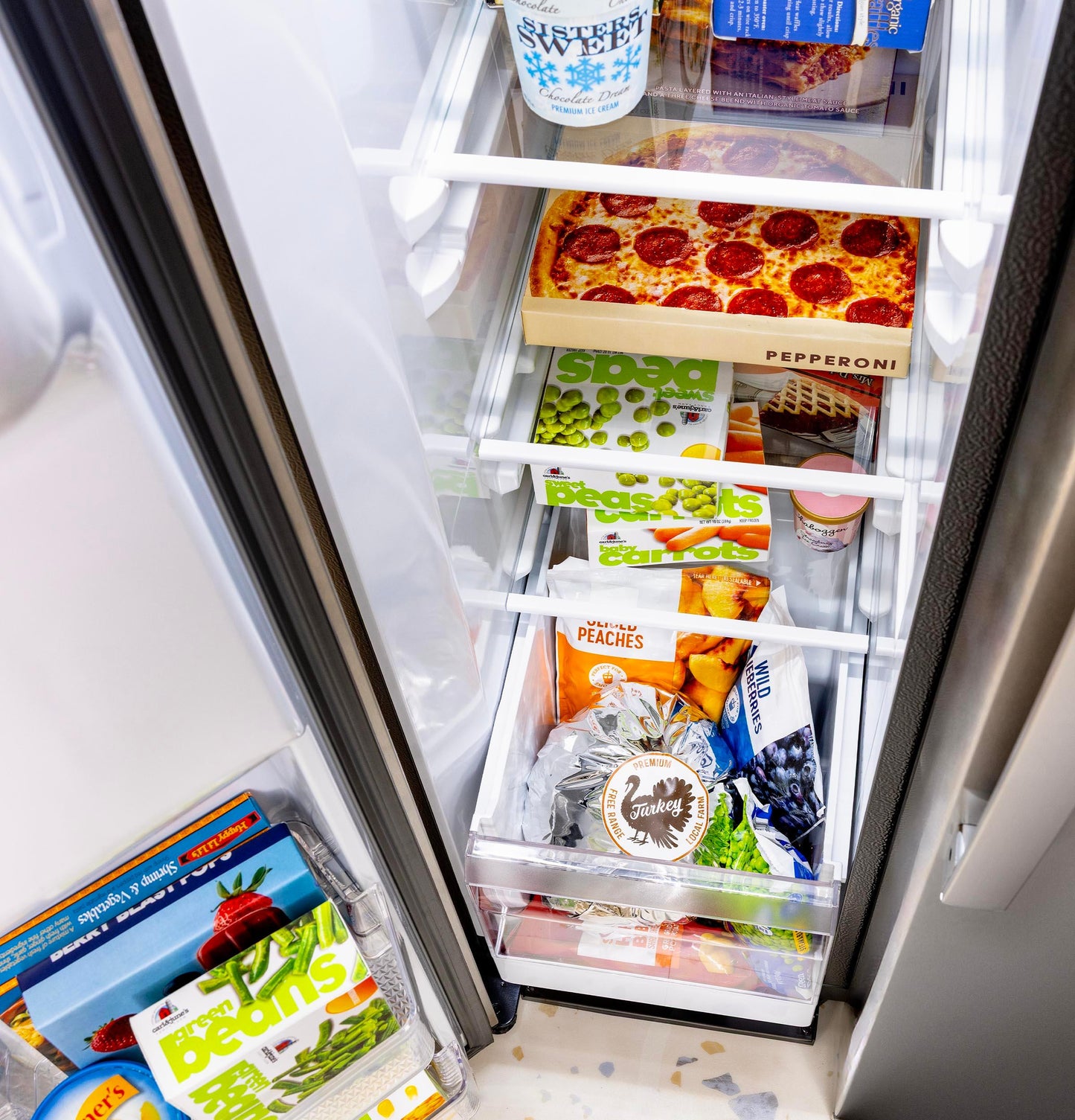 Ge Appliances GZE24NYYFS Ge® Energy Star® 23.6 Cu. Ft. Counter-Depth Side-By-Side Refrigerator With Extra Tall Dispenser And In-Door Icemaker