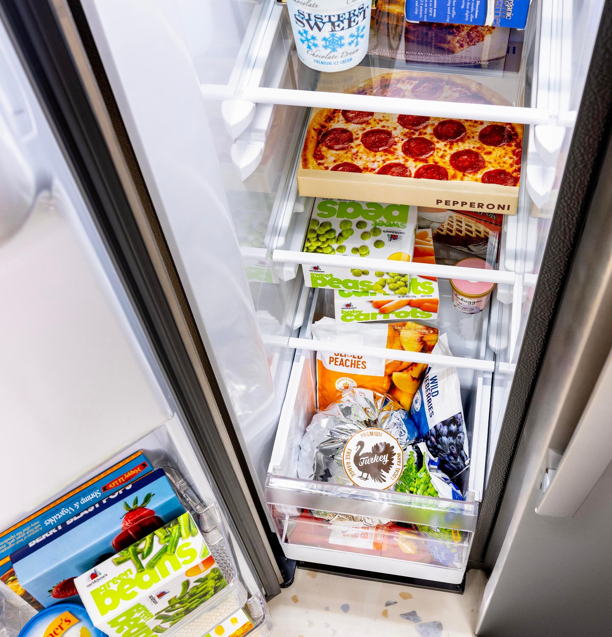 Ge Appliances GZS24NYYFS Ge® 23.6 Cu. Ft. Counter-Depth Side-By-Side Refrigerator With Extra Tall Dispenser And In-Door Icemaker