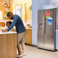Ge Appliances GZE24NYYFS Ge® Energy Star® 23.6 Cu. Ft. Counter-Depth Side-By-Side Refrigerator With Extra Tall Dispenser And In-Door Icemaker