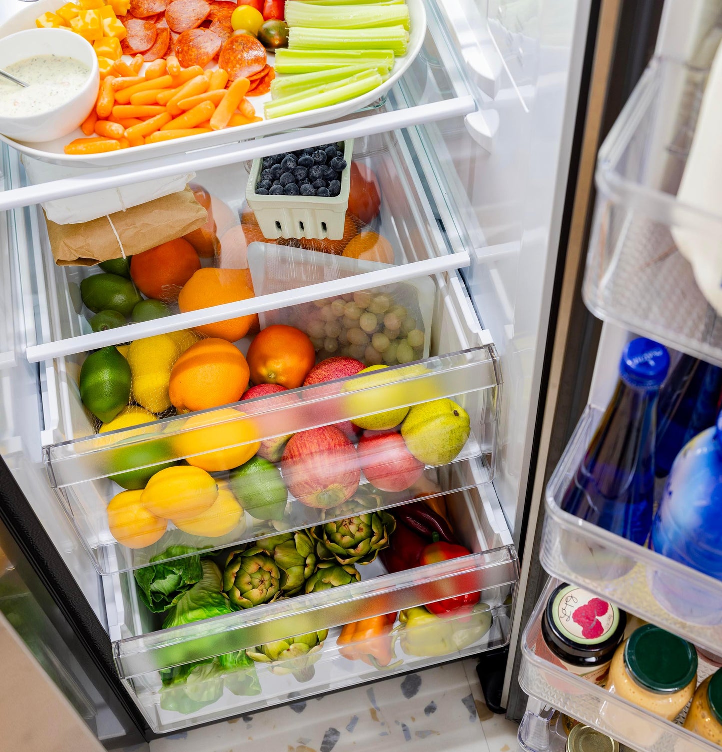 Ge Appliances GSS28NMYES Ge® 27.9 Cu. Ft. Side-By-Side Refrigerator With Extra Tall Dispenser And In-Door Icemaker