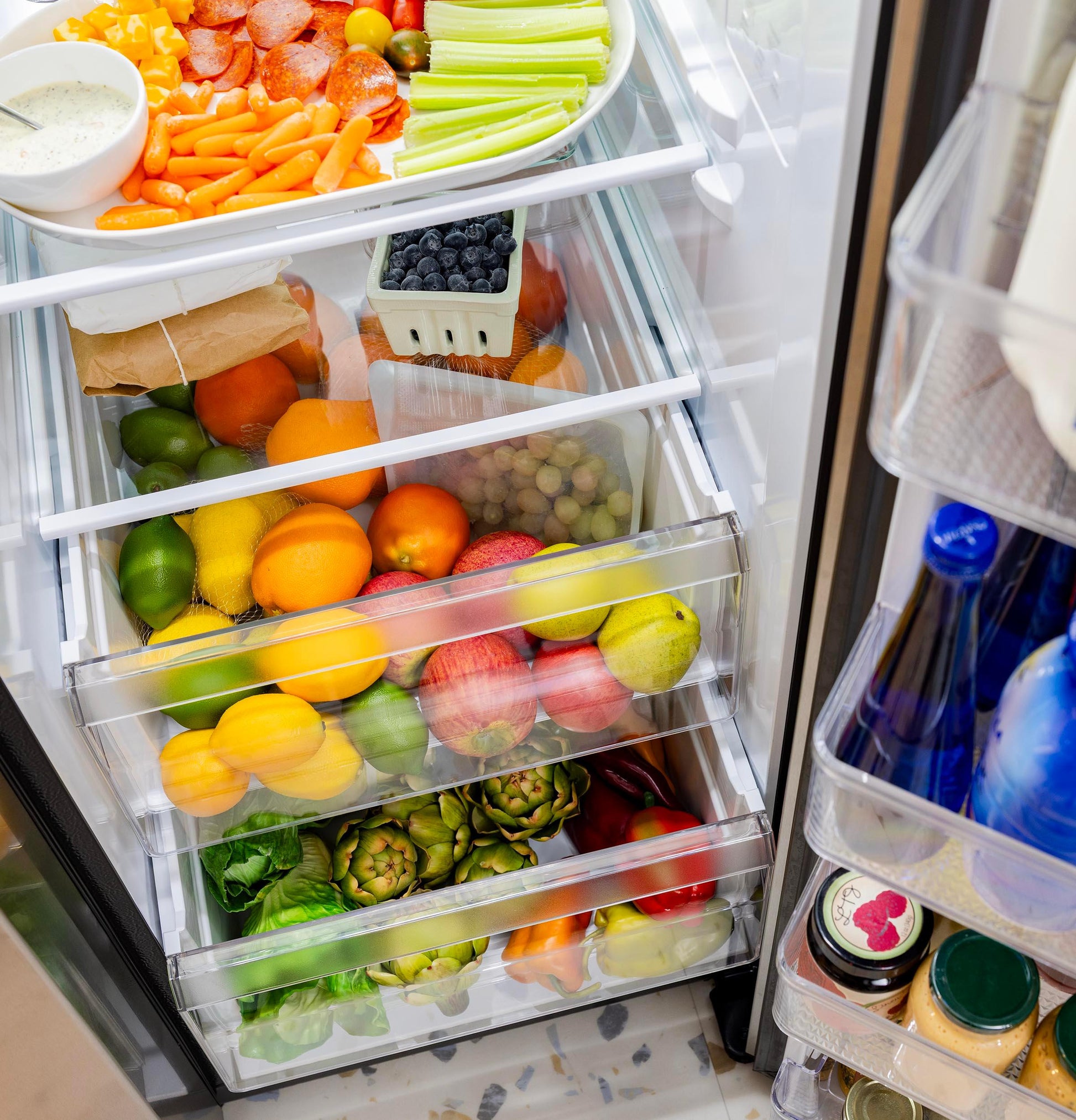 Ge Appliances GZS24NMYES Ge® 23.6 Cu. Ft. Counter-Depth Side-By-Side Refrigerator With Extra Tall Dispenser And In-Door Icemaker