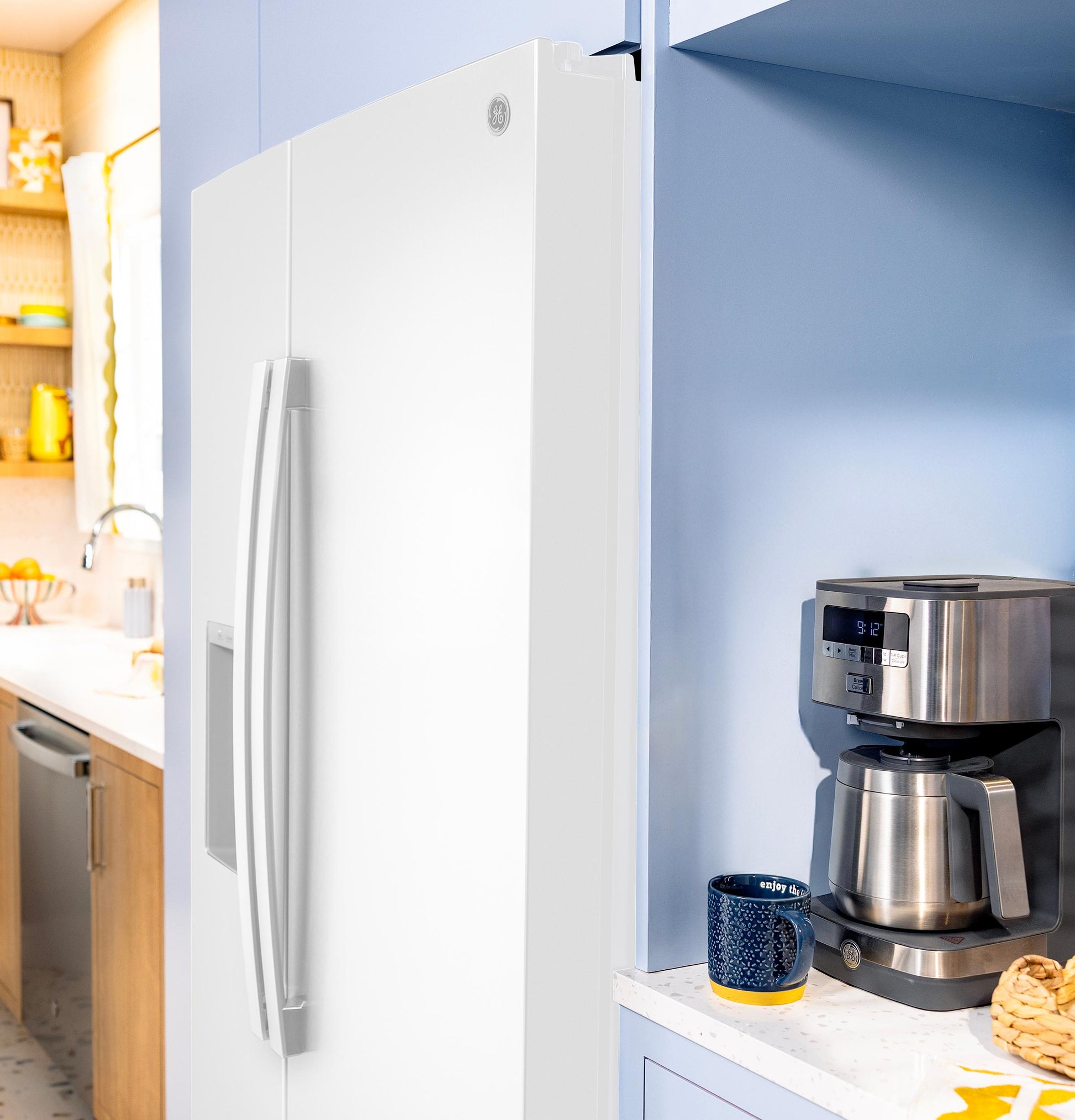 Ge Appliances GZE24NGYWW Ge® Energy Star® 23.6 Cu. Ft. Counter-Depth Side-By-Side Refrigerator With Extra Tall Dispenser And In-Door Icemaker