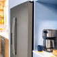 Ge Appliances GZS24NMYES Ge® 23.6 Cu. Ft. Counter-Depth Side-By-Side Refrigerator With Extra Tall Dispenser And In-Door Icemaker