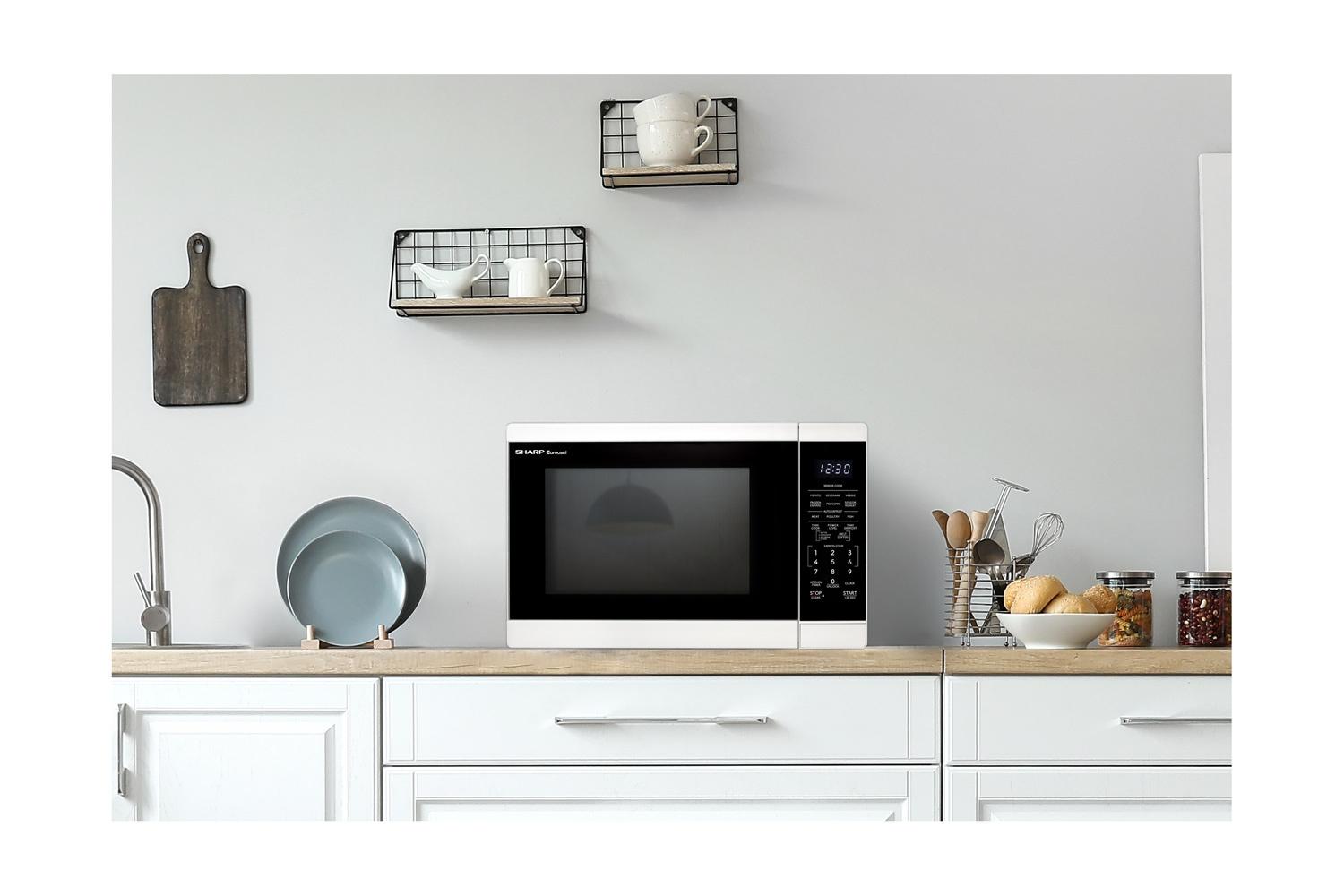 Sharp SMC1461KW Sharp 1.4 Cu. Ft. 1100W White Countertop Microwave Oven