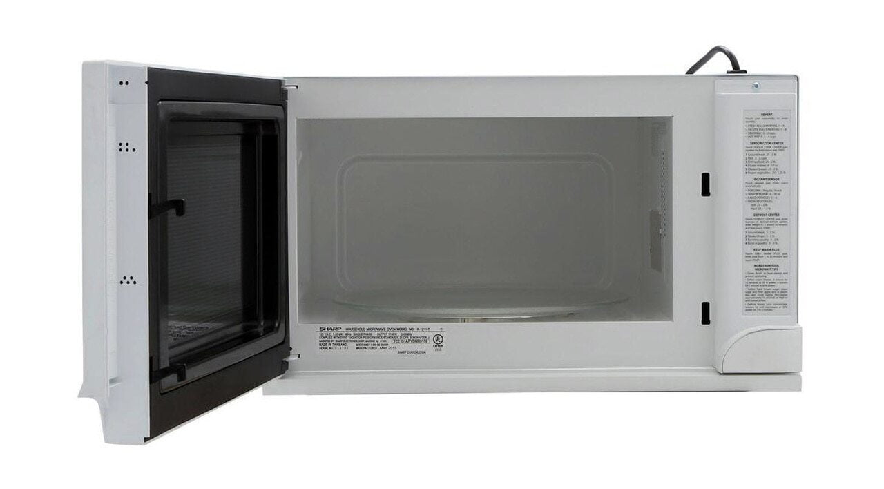 Sharp R1211TY 1.5 Cu. Ft. 1100W White Sharp Over-The-Counter Carousel Microwave Oven