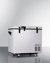 Summit SPRF86M2 Portable 12V/24V Cooler Capable Of Operation As Refrigerator (2-8(Degree)C) Or Freezer (-12(Degree)C), With Insulated Cover, Interior Wire Basket, Factory-Installed Lock, Strap Handle, And Four Pre-Installed Wheels